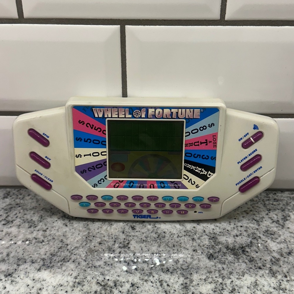 Tiger Electronics Handheld Sound Game White Wheel of Fortune Vintage 1995 Works